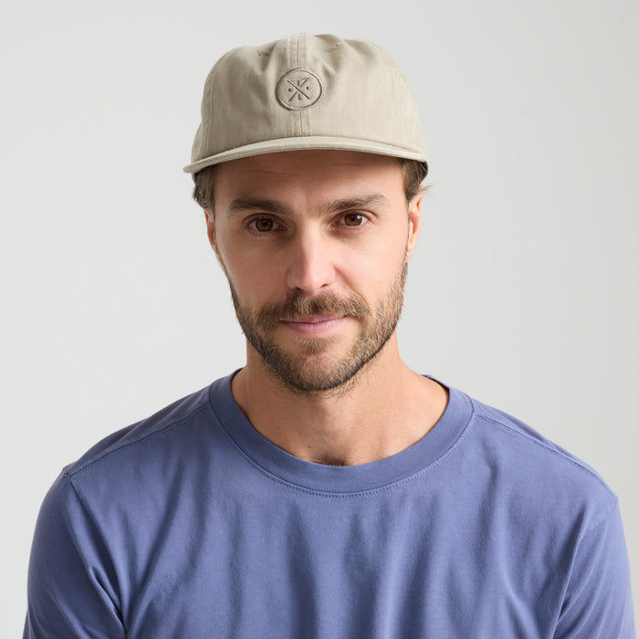 Assorted Roark adventure caps displayed, featuring styles from sun hats to baseball caps, perfect for outdoor travel and exploration.
