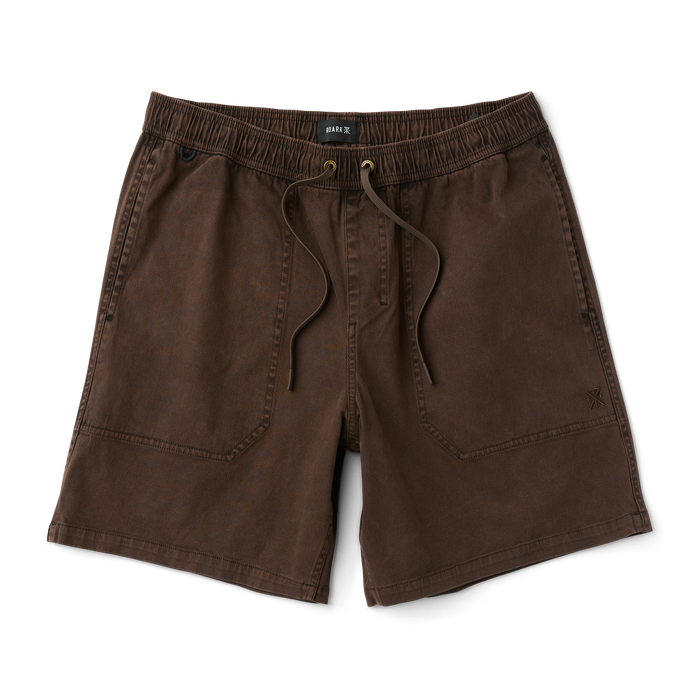 Stylish outdoor adventure gear by Roark, showcasing durable and functional design in a natural setting.