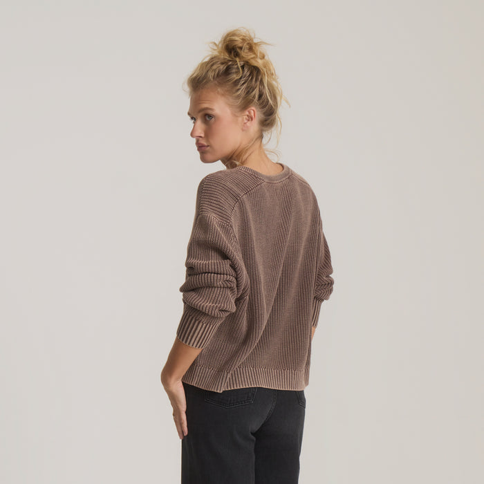 Made To Fade Sweater in coco bean shown on model from side angle wearing black jeans with hair in bun