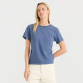 Made To Fade Premium Tee in Neptune blue worn by model with cream pants, front view on neutral background