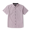 Close-up of a durable Roark adventure dress shirt featuring a sturdy collar, buttons, and practical pockets, designed for outdoor and travel enthusiasts.