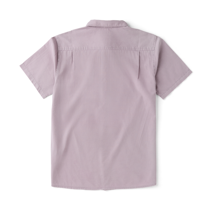 Close-up of a versatile, high-performance Roark shirt featuring durable buttons, a crisp collar, and active-style sleeves, ideal for both adventure and everyday wear.