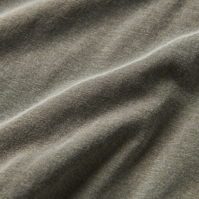 A close-up image of the Roark Made To Fade Short Sleeve Tee in Washed Military, showcasing the details and craftsmanship. Shop the official Roark store now.