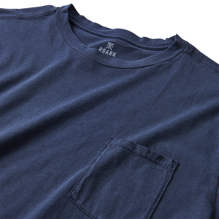 A close-up image of the Roark Made To Fade Short Sleeve Tee in Washed Navy, showcasing the details and craftsmanship. Shop the official Roark store now.