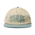 Outdoor-focused apparel by Roark, model RH748 in oat color, displayed in a natural setting to evoke the spirit of adventure and travel.
