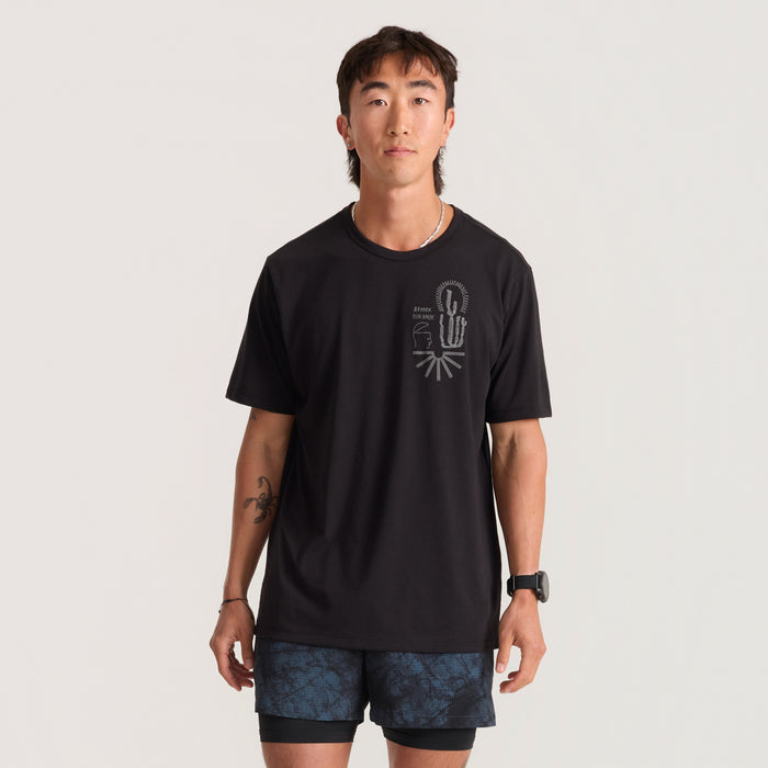 Close-up of a black Roark active shirt featuring a detailed sleeve design and practical pocket, ideal for adventure and travel.
