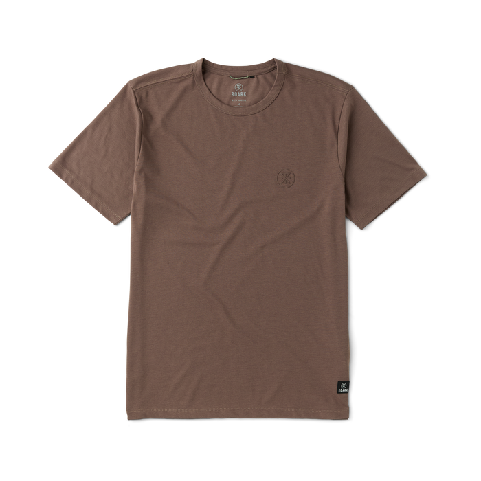 Active shirt with distinctive sleeves displayed in an adventure-ready setting, perfect for travelers and outdoor enthusiasts.