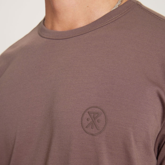 Active long-sleeved t-shirt focusing on adventure and fitness during an outdoor excursion, highlighting the durable and flexible design.