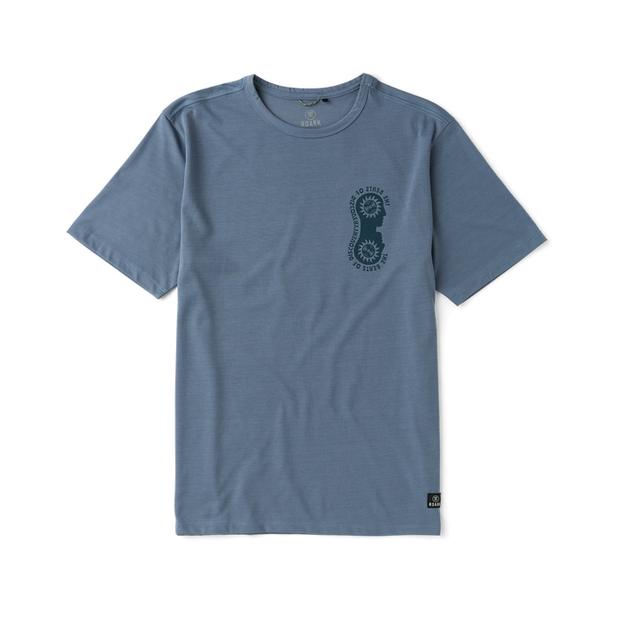 Close-up of a Roark active shirt sleeve featuring durable textile fabric, ideal for adventure and outdoor activities.