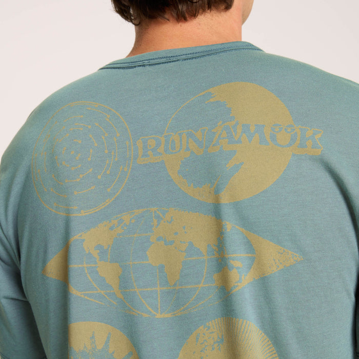 Close-up of an active shirt paired with denim, perfect for adventure and travel, featuring detailed textile design.
