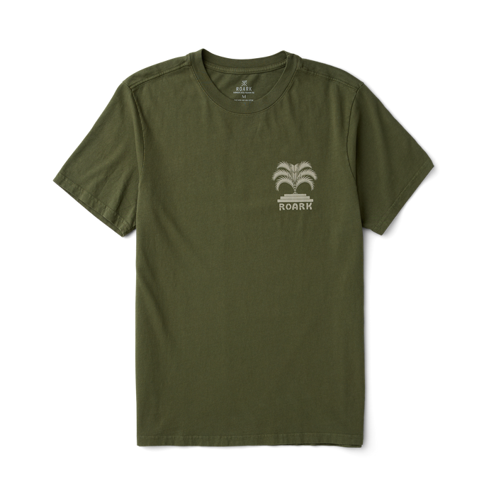 Close-up of a Roark active shirt label on a military green fabric, designed for outdoor adventures.