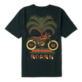 Adventurous rider wearing Roark active shirt while riding a motorcycle through rugged terrain.