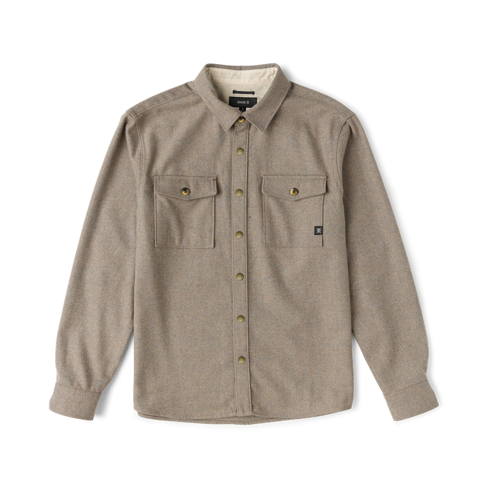 Tan wool flannel shirt with dual chest pockets, gold snap buttons, and cream fleece lining, displayed flat lay against white background