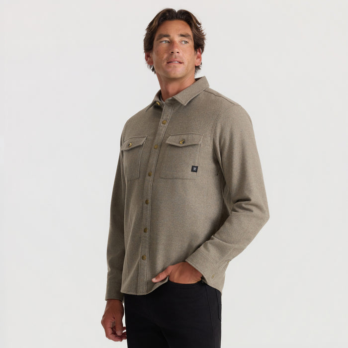 Dusty green Nordsman 2.0 long sleeve flannel shirt on model with chest pockets and button front closure