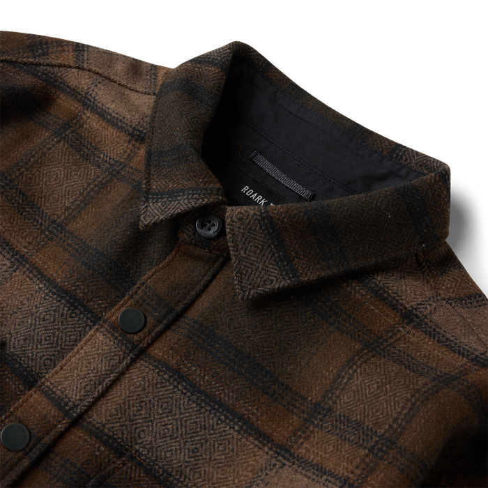 Nordsman 2.0 long sleeve flannel in rust and black plaid with black buttons and collar detail