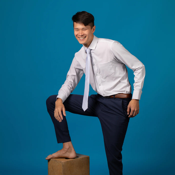 Pale blue houndstooth tie on white shirt