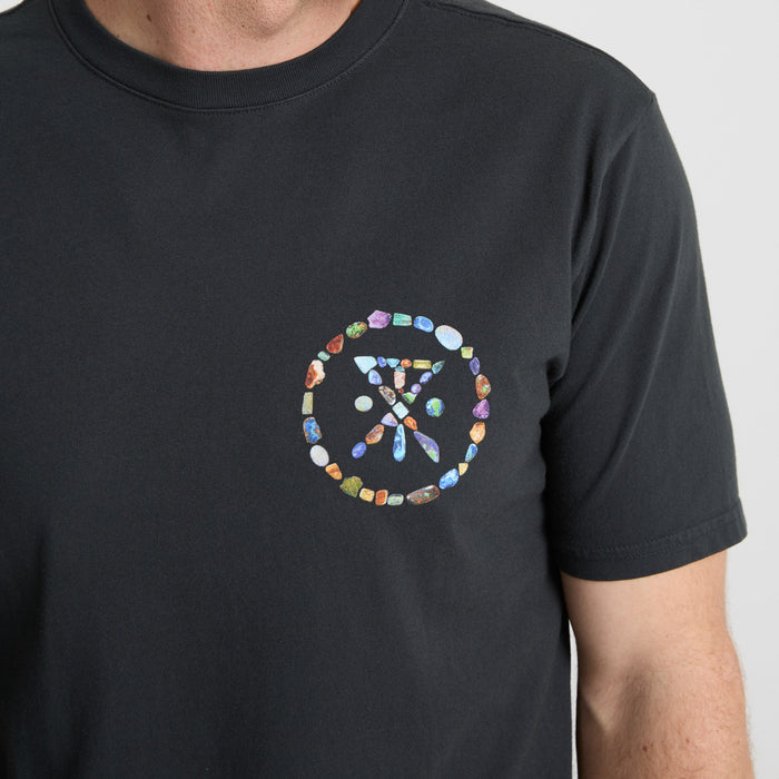 Roark black active shirt featuring adventure symbol logo, designed for travel and outdoor activities.