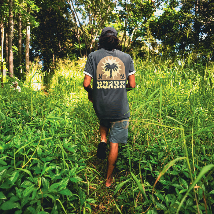 Active palm tree patterned t-shirt made from hemp, ideal for jungle adventures.