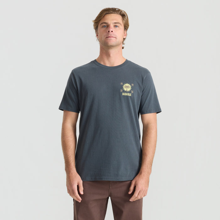 Close-up of the sleeve of a Roark active shirt, designed for outdoor adventures.