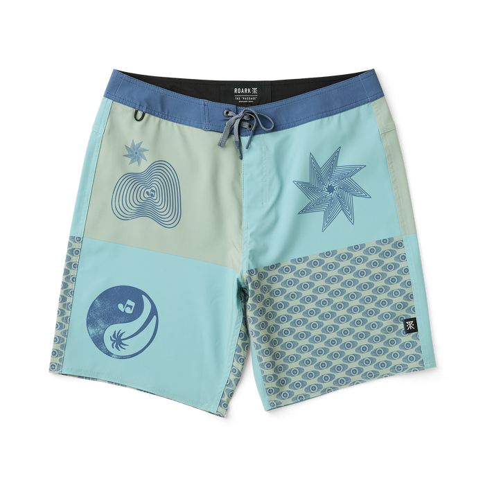 Surfer wearing Roark boardshorts while skillfully riding a wave with a surfboard, embodying the adventurous spirit of water sports.