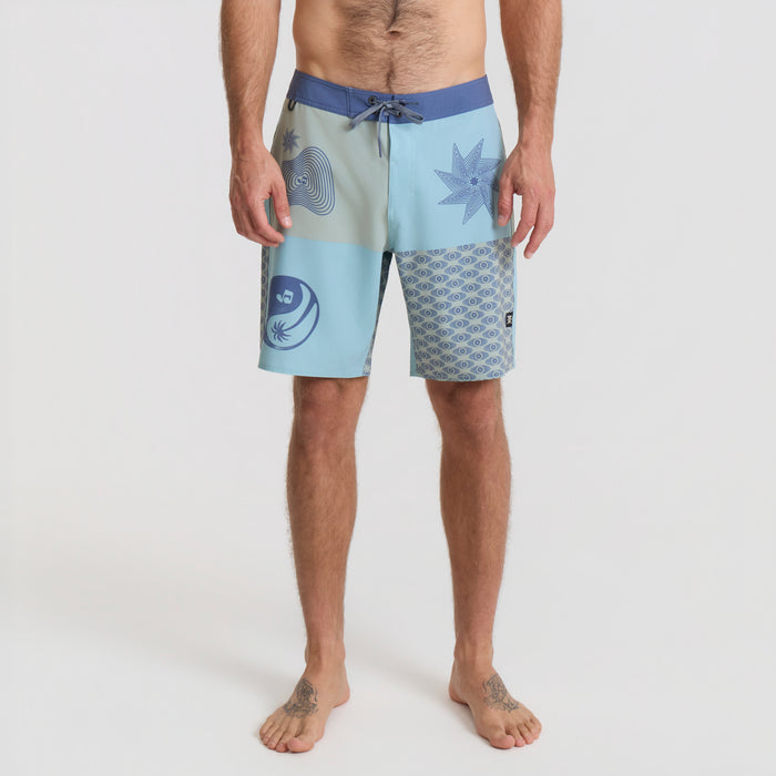 Action-packed scene of a surfer riding a wave with Roark boardshorts and surfboard, highlighting the durable and adventurous design of Roark's surfing equipment.