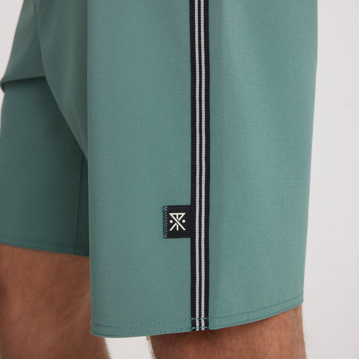 Assortment of stylish Roark boardshorts and trunks displayed, ideal for outdoor and adventure activities.