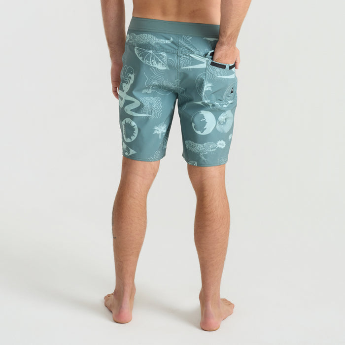 Assorted Roark adventure shorts on display, featuring boardshorts, active shorts, Bermuda shorts, and trunks, perfect for exploring and travel.