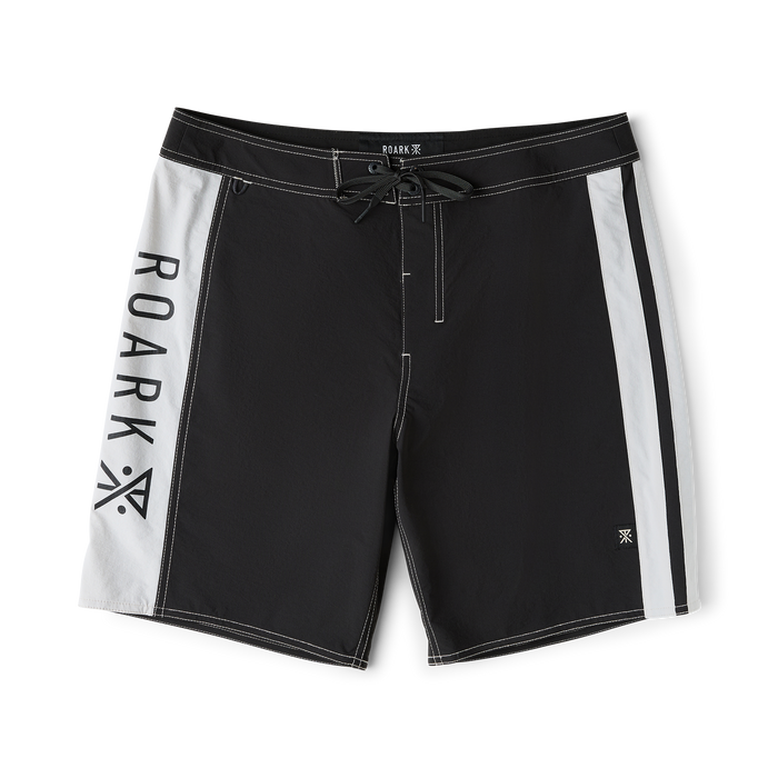 Roark Passage Panel Boardshorts in black with white side panels and drawstring closure, flat lay view