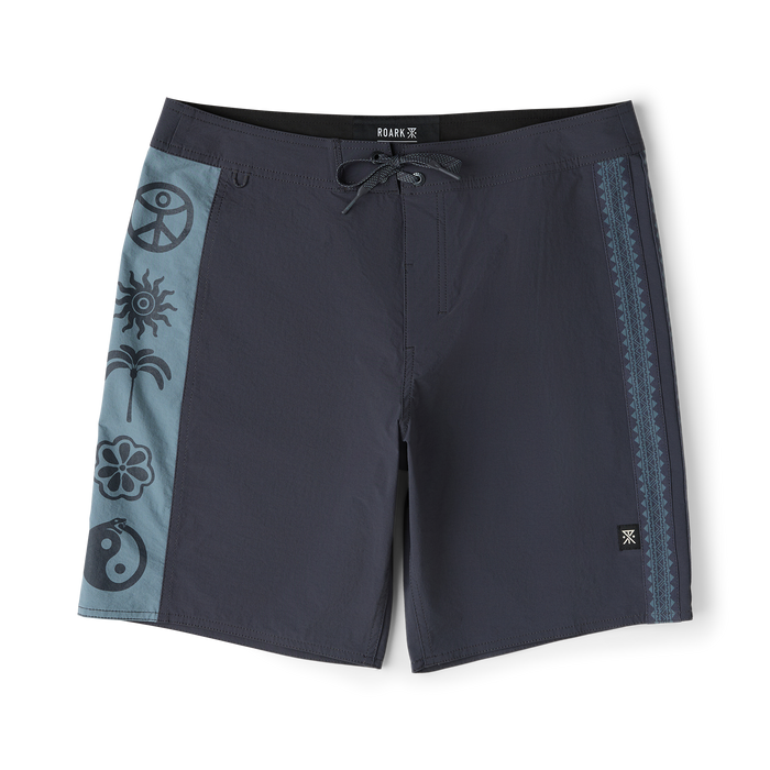 Roark Passage Panel Boardshorts in ebony with blue side panel featuring peace, sun, palm, and flower graphics, flat lay