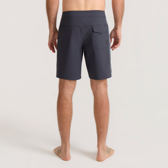 Ebony Passage Panel Boardshorts shown from back on male model, featuring rear pocket and drawstring waistband