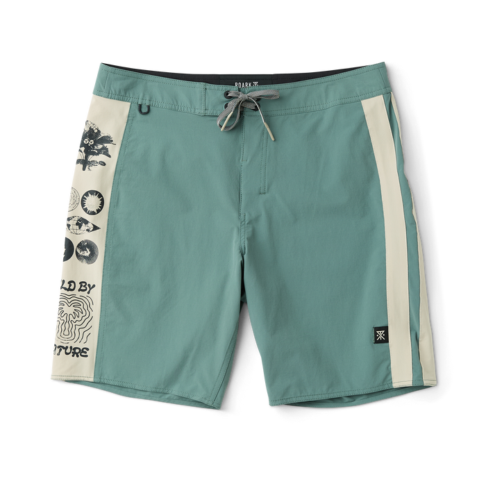 Exploring the unknown with Roark's durable outdoor gear in serene green surroundings.