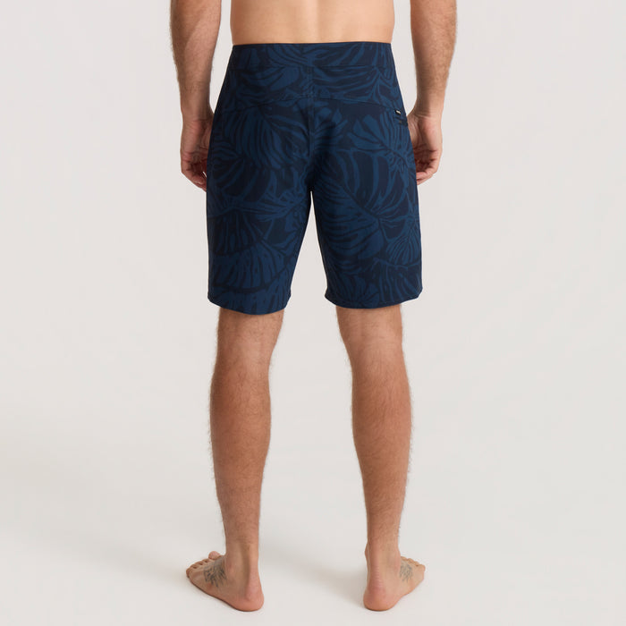 Roark navy adventure gear showcased in natural outdoor setting