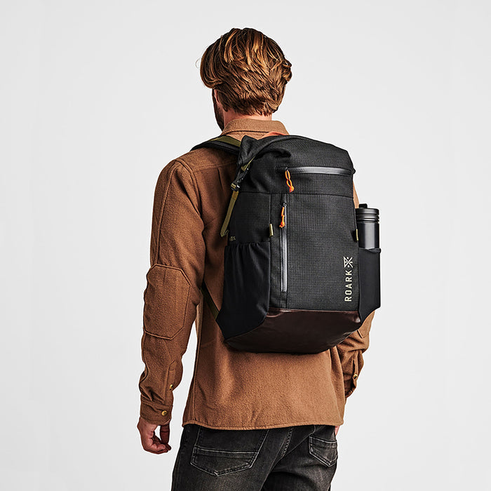 Roark Passenger 27L 2.0 Travel Bag in Black, showcasing a front view of the bag.