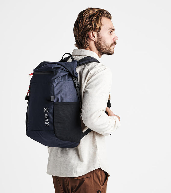 Roark Passenger 27L 2.0 Travel Bag in Blue, showcasing a front view of the bag.