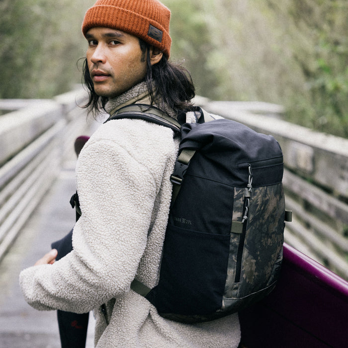 Versatile adventure-ready backpack from Roark, perfectly suited for hiking and travel, featuring essential hiking equipment and sturdy design.