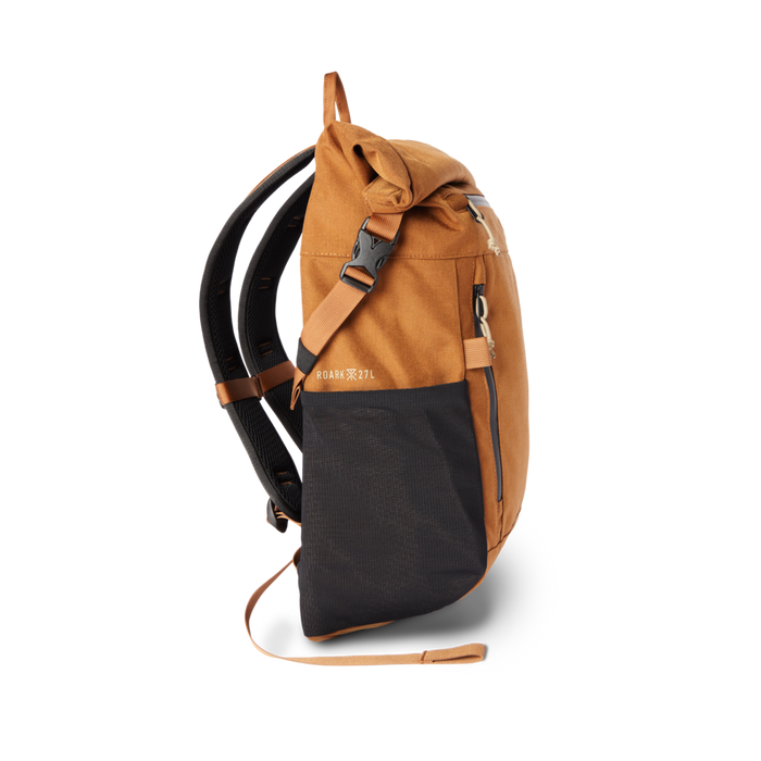 Roark Passenger 27L 2.0 Travel Bag in Toffee, showcasing its durable construction and comfortable carry handles, built for adventure travel.