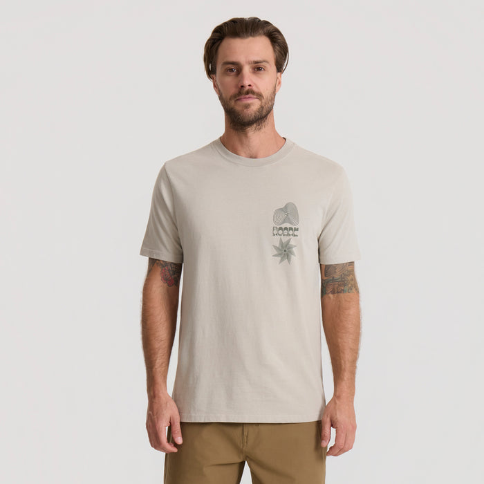 Close-up of a sleeve on an active shirt from Roark, designed for adventure and outdoor activities.