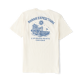 Cream colored t-shirt with blue graphic print reading Roark Expeditions and Exploring Points Unknown on back view flat lay