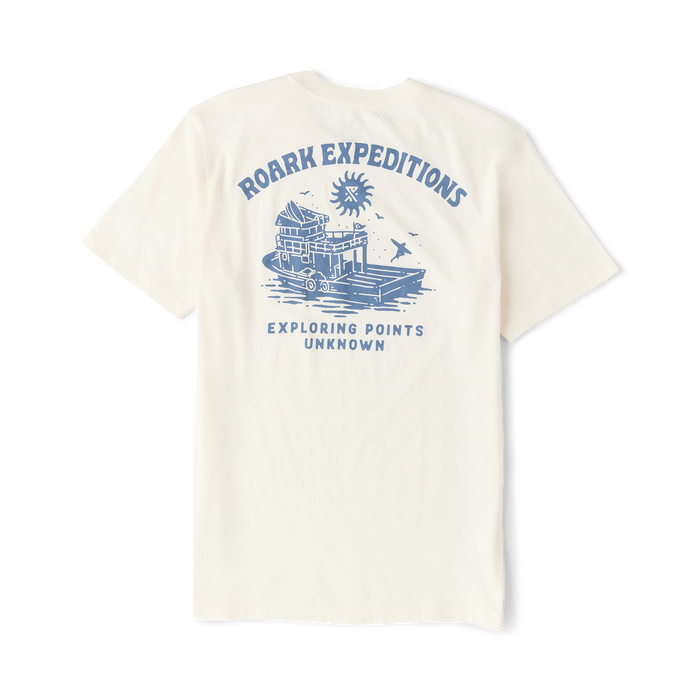 Cream colored t-shirt with blue graphic print reading Roark Expeditions and Exploring Points Unknown on back view flat lay