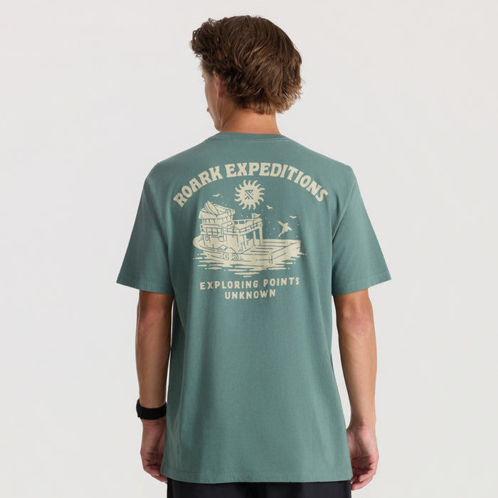 Slate green short-sleeve tee with cream Roark Expeditions graphic on back featuring boat and sun design
