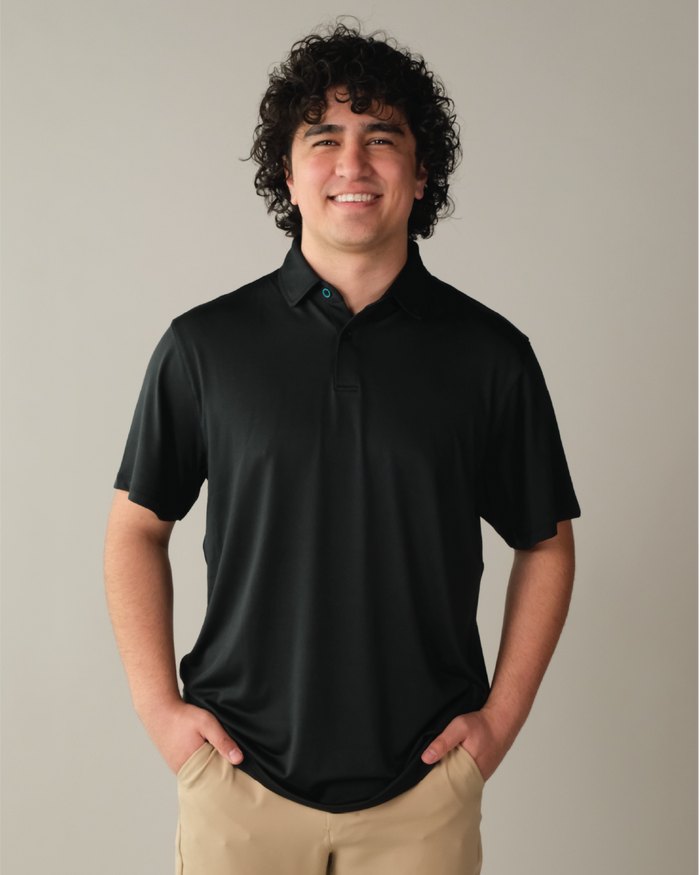 Man wearing a pitch black polo shirt