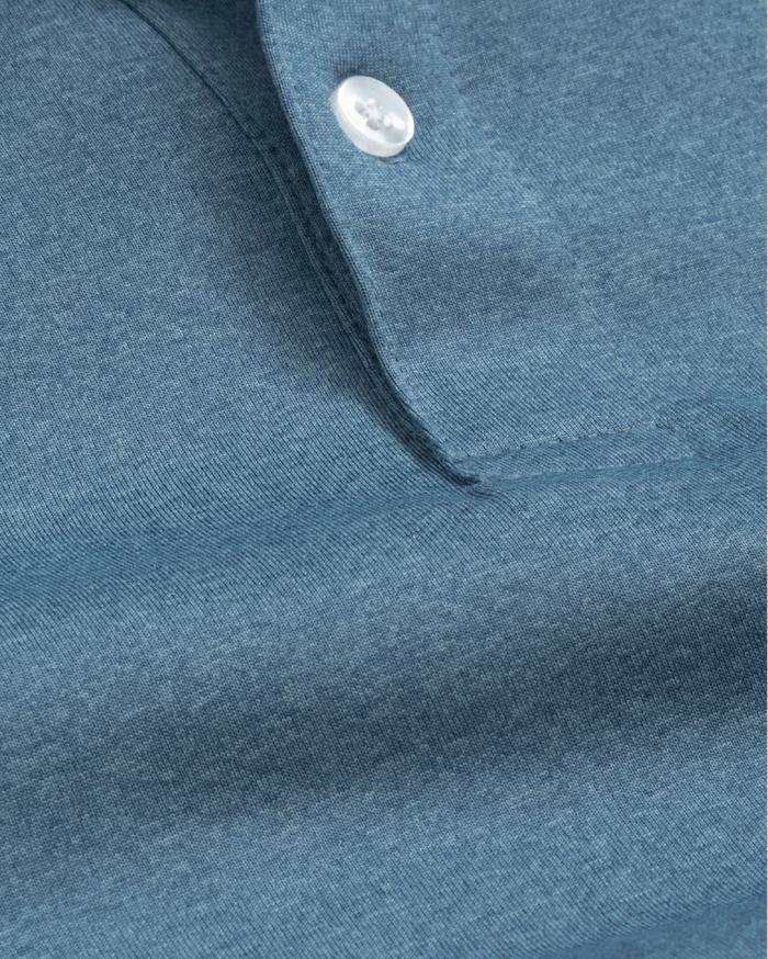 A close up of heather blue polo shirt