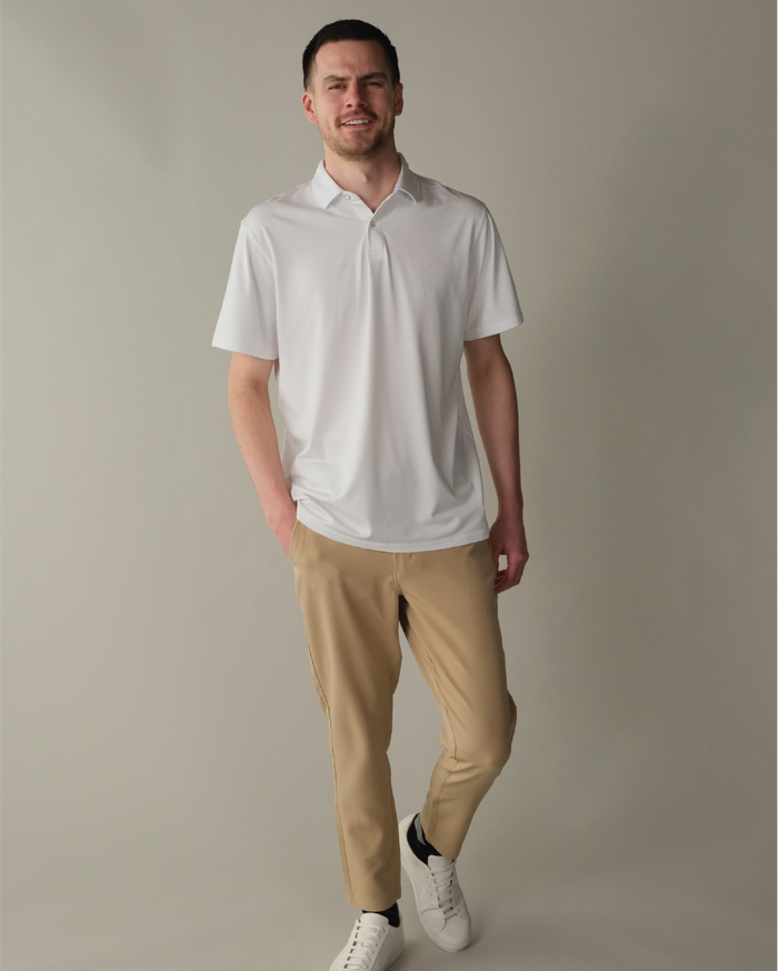 Man wearing cloud white polo shirt