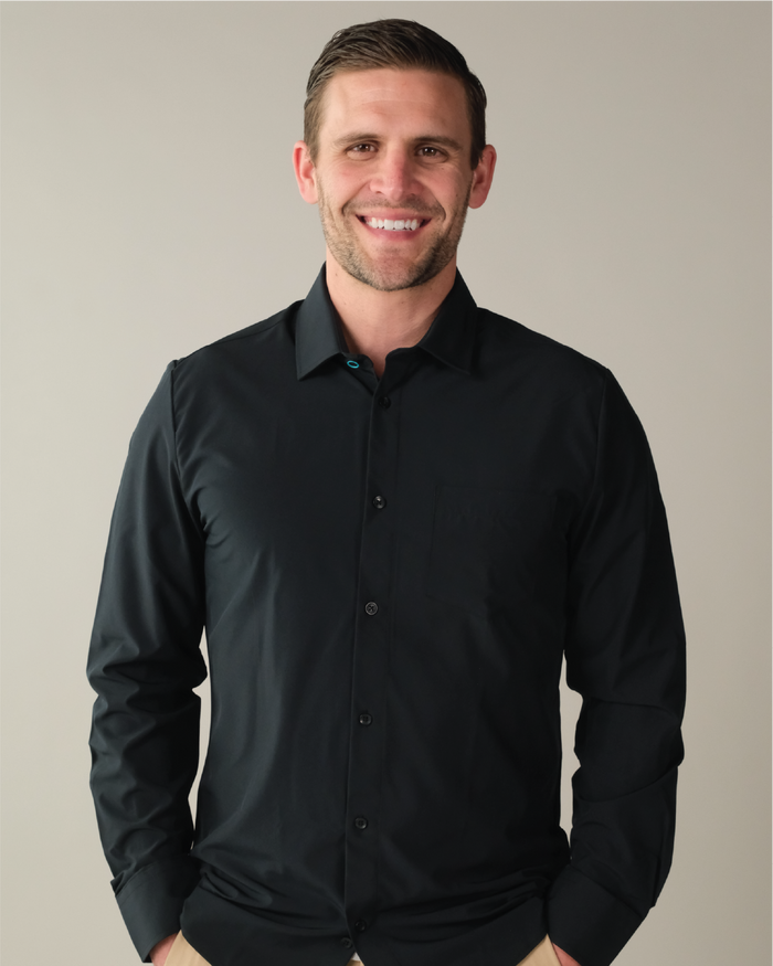 Man wearing a black dress shirt