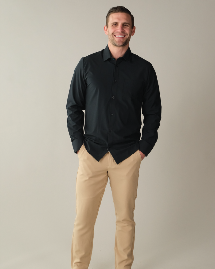 Man wearing a black dress shirt