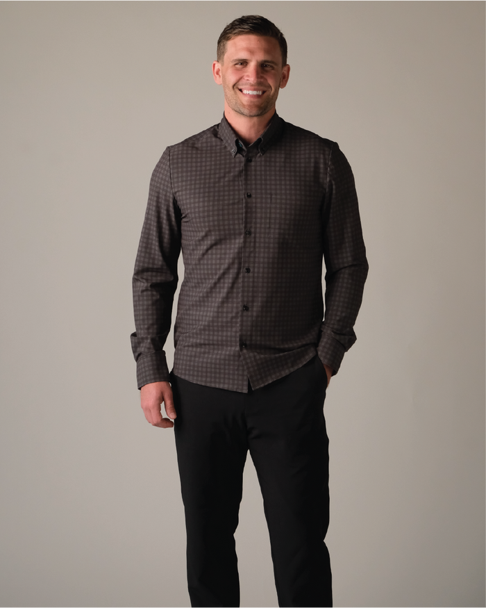 Man wearing wearing a charcoal w/ black windowpane shirt