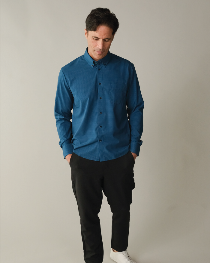 Man wearing dark blue with navy check shirt