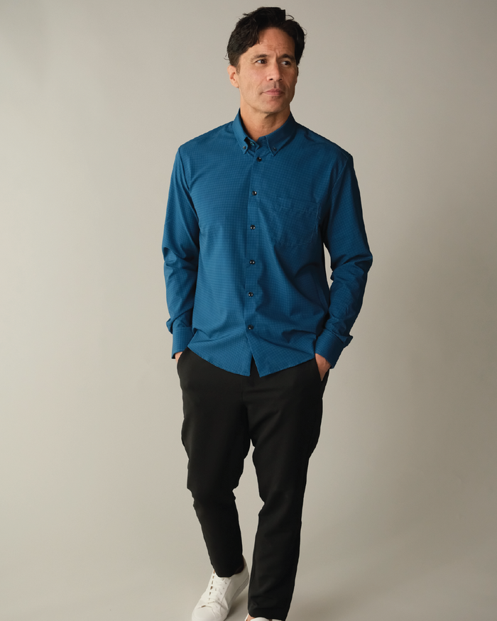 Man wearing dark blue with navy check shirt