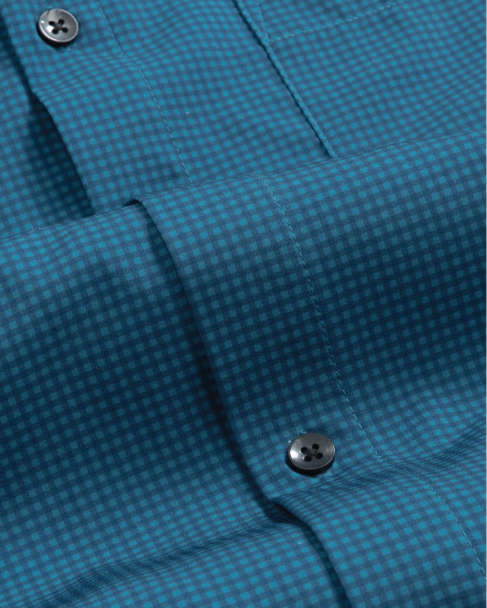 Close up dark blue with navy check shirt. Black buttons