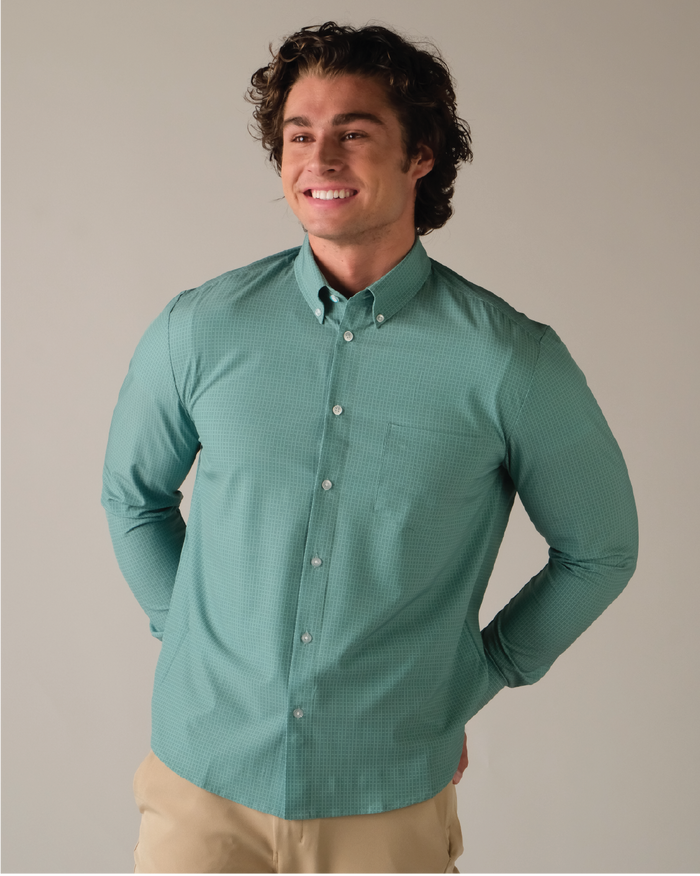 Man wearing a green shirt w/grids